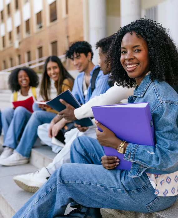 Diverse students walking together on a college campus